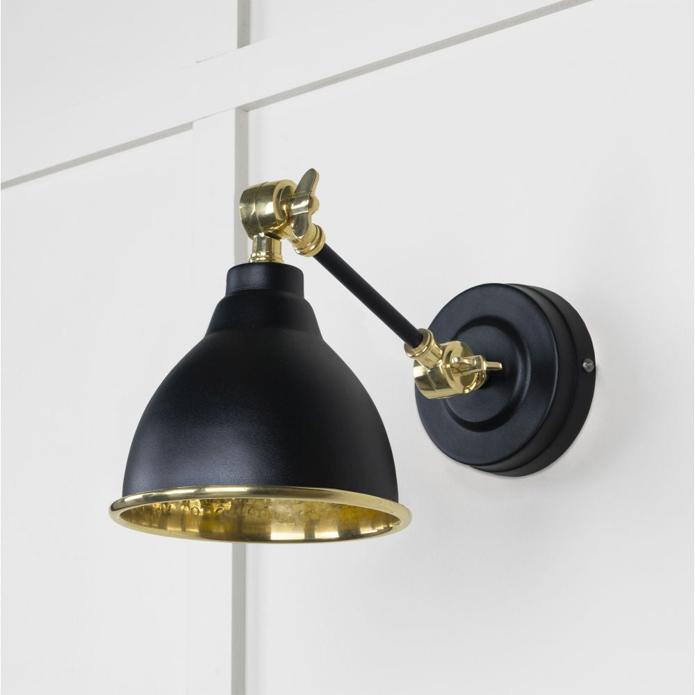 This is an image showing From The Anvil - Hammered Brass Brindley Wall Light in Elan Black available from T.H Wiggans Architectural Ironmongery in Kendal, quick delivery and discounted prices