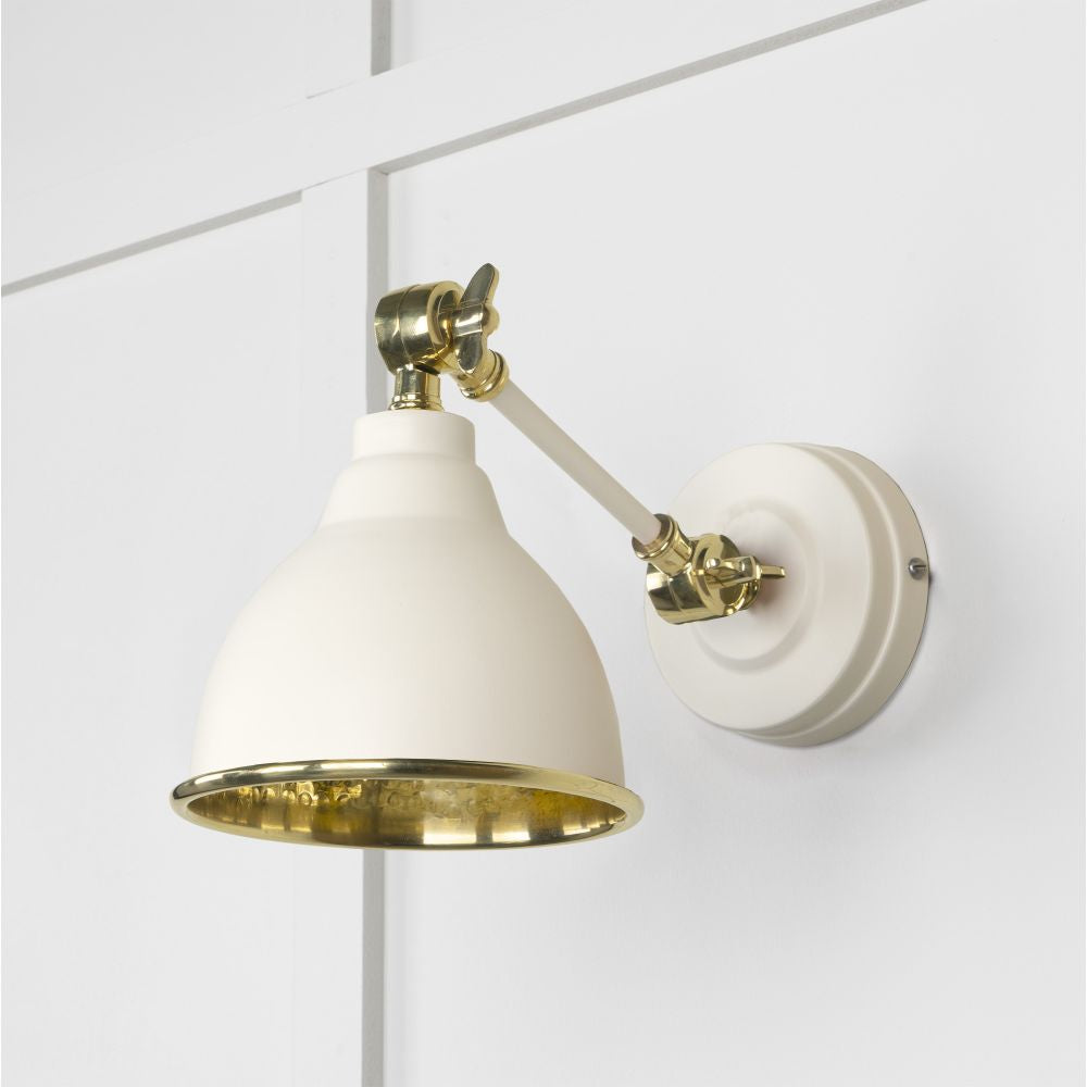 This is an image showing From The Anvil - Hammered Brass Brindley Wall Light in Teasel available from T.H Wiggans Architectural Ironmongery in Kendal, quick delivery and discounted prices