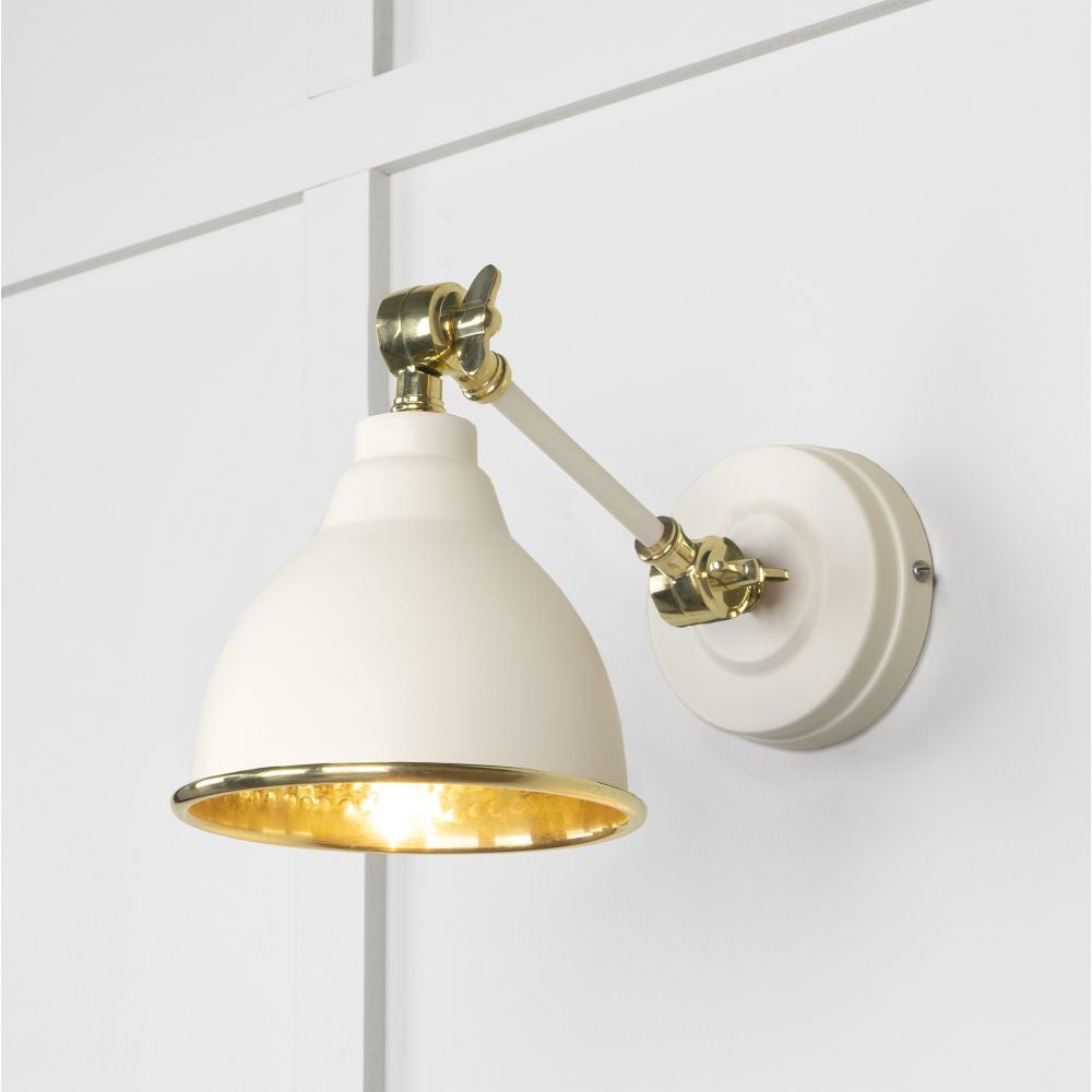 This is an image showing From The Anvil - Hammered Brass Brindley Wall Light in Teasel available from T.H Wiggans Architectural Ironmongery in Kendal, quick delivery and discounted prices