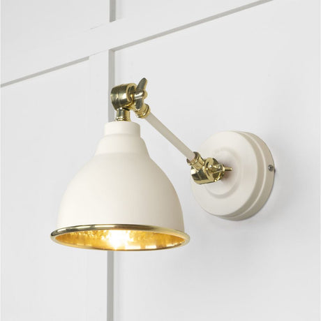 This is an image showing From The Anvil - Hammered Brass Brindley Wall Light in Teasel available from T.H Wiggans Architectural Ironmongery in Kendal, quick delivery and discounted prices