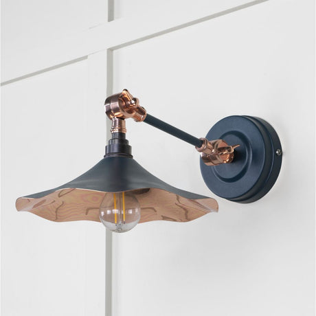 This is an image showing From The Anvil - Smooth Copper Flora Wall Light in Dusk available from T.H Wiggans Architectural Ironmongery in Kendal, quick delivery and discounted prices