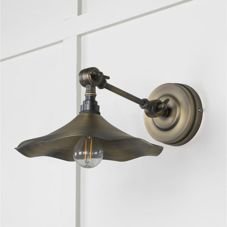 This is an image showing From The Anvil - Aged Brass Flora Wall Light available from T.H Wiggans Architectural Ironmongery in Kendal, quick delivery and discounted prices