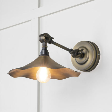 This is an image showing From The Anvil - Aged Brass Flora Wall Light available from T.H Wiggans Architectural Ironmongery in Kendal, quick delivery and discounted prices