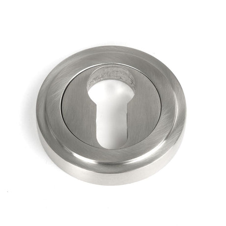 This is an image of From The Anvil - Satin Marine SS (316) Round Euro Escutcheon (Art Deco) available to order from T.H Wiggans Architectural Ironmongery in Kendal, quick delivery and discounted prices.