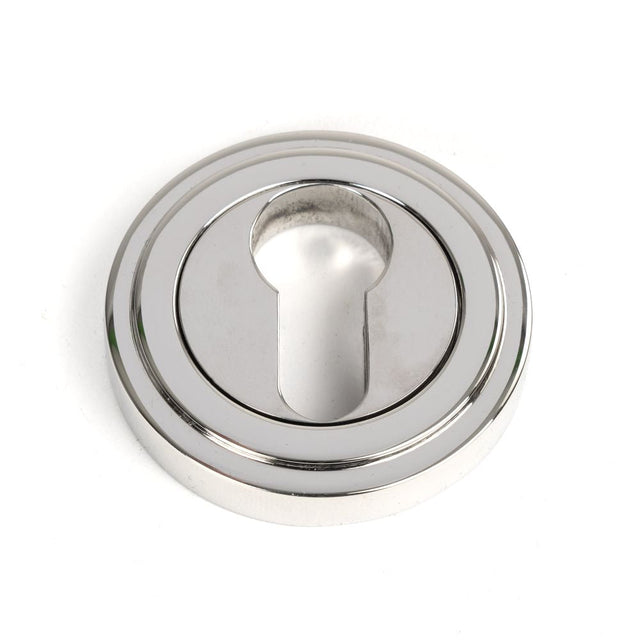 This is an image of From The Anvil - Polished Marine SS (316) Round Euro Escutcheon (Art Deco) available to order from T.H Wiggans Architectural Ironmongery in Kendal, quick delivery and discounted prices.