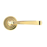 This is an image showing From The Anvil - Aged Brass Avon Round Lever on Rose Set (Art Deco) - Unsprung available from trade door handles, quick delivery and discounted prices