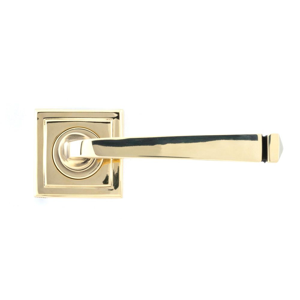 This is an image showing From The Anvil - Aged Brass Avon Round Lever on Rose Set (Square) - Unsprung available from trade door handles, quick delivery and discounted prices