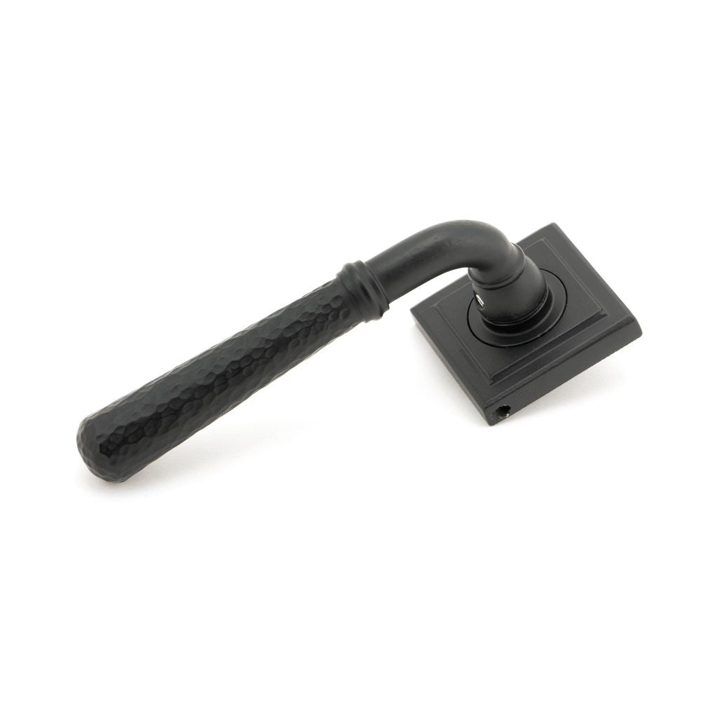 This is an image of From The Anvil - Matt Black Hammered Newbury Lever on Rose Set (Square) - Unspru available to order from T.H Wiggans Architectural Ironmongery in Kendal, quick delivery and discounted prices.