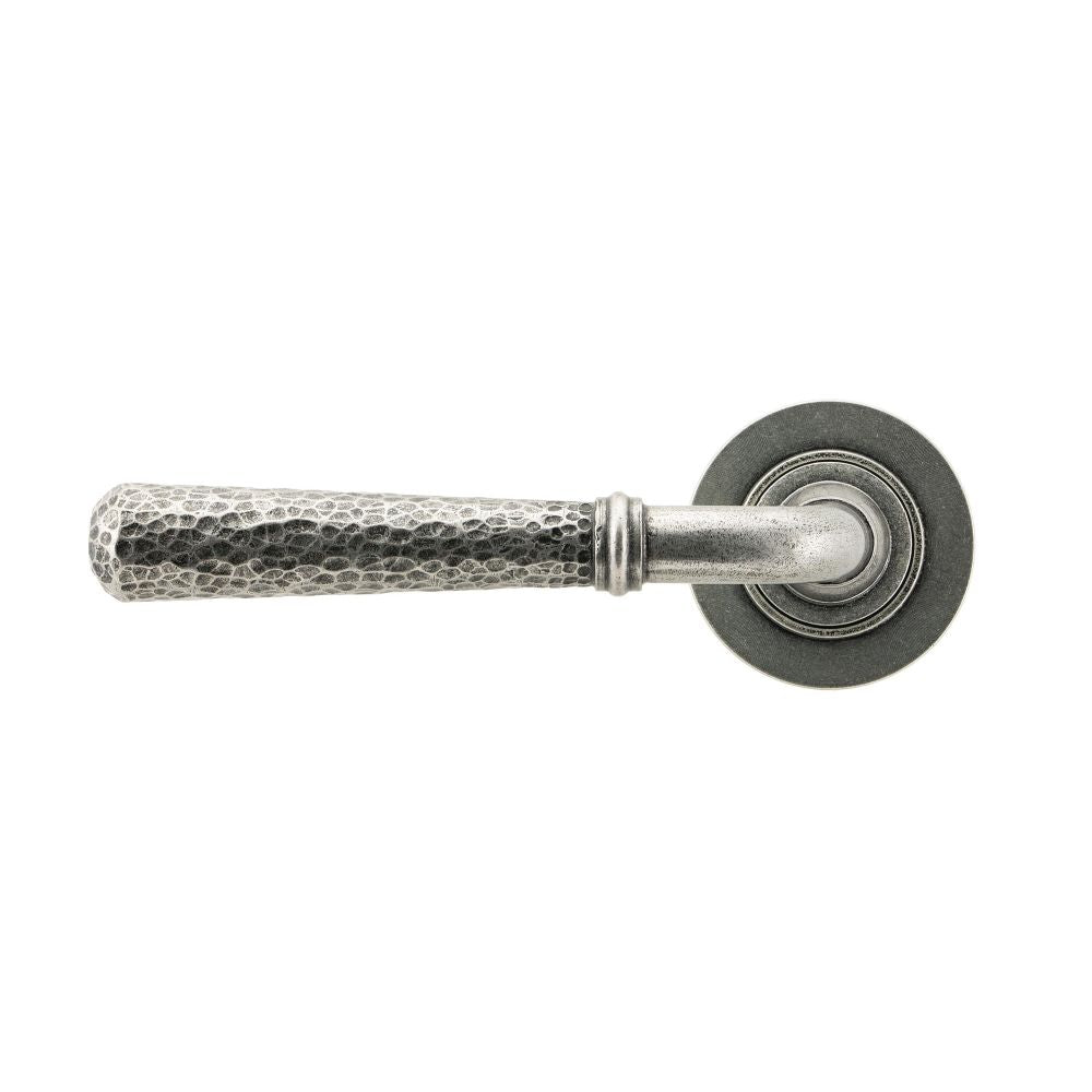 This is an image showing From The Anvil - Pewter Hammered Newbury Lever on Rose Set (Plain) - Unsprung available from trade door handles, quick delivery and discounted prices