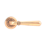 This is an image showing From The Anvil - Polished Bronze Newbury Lever on Rose Set (Plain) - Unsprung available from trade door handles, quick delivery and discounted prices