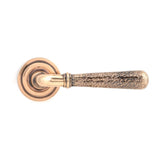 This is an image showing From The Anvil - Pol. Bronze Hammered Newbury Lever on Rose Set (Art Deco) - Uns available from trade door handles, quick delivery and discounted prices