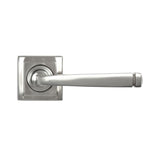 This is an image showing From The Anvil - Satin Marine SS (316) Avon Round Lever on Rose Set (Square) - U available from trade door handles, quick delivery and discounted prices