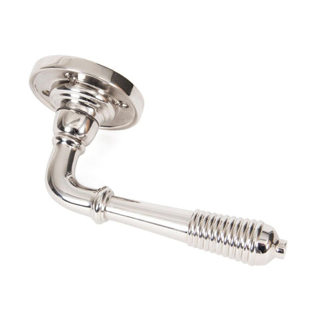 This is an image showing From The Anvil - Polished Nickel Reeded Lever on Rose Set - Unsprung available from trade door handles, quick delivery and discounted prices