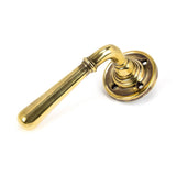 This is an image of From The Anvil - Aged Brass Newbury Lever on Rose Set - Unsprung available to order from T.H Wiggans Architectural Ironmongery in Kendal, quick delivery and discounted prices.