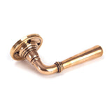 This is an image showing From The Anvil - Polished Bronze Newbury Lever on Rose Set - Unsprung available from trade door handles, quick delivery and discounted prices