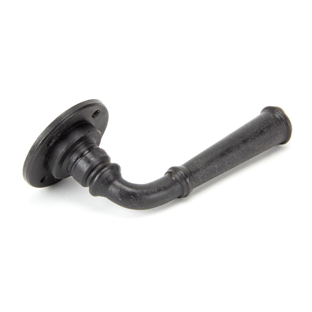 This is an image showing From The Anvil - External Beeswax Regency Lever on Rose Set - Unsprung available from trade door handles, quick delivery and discounted prices