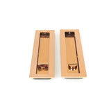 This is an image showing From The Anvil - Polished Bronze 250mm Plain Rectangular Pull - Privacy Set available from trade door handles, quick delivery and discounted prices