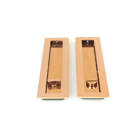 This is an image showing From The Anvil - Polished Bronze 250mm Plain Rectangular Pull - Privacy Set available from trade door handles, quick delivery and discounted prices