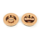 This is an image of From The Anvil - Polished Bronze 60mm Plain Round Pull - Privacy Set available to order from T.H Wiggans Architectural Ironmongery in Kendal, quick delivery and discounted prices.