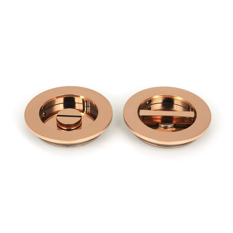 This is an image of From The Anvil - Polished Bronze 75mm Plain Round Pull - Privacy Set available to order from T.H Wiggans Architectural Ironmongery in Kendal, quick delivery and discounted prices.