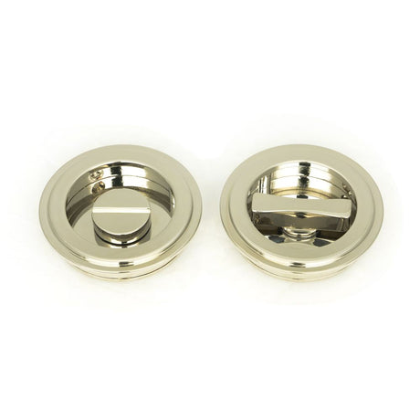 This is an image of From The Anvil - Polished Nickel 60mm Art Deco Round Pull - Privacy Set available to order from T.H Wiggans Architectural Ironmongery in Kendal, quick delivery and discounted prices.