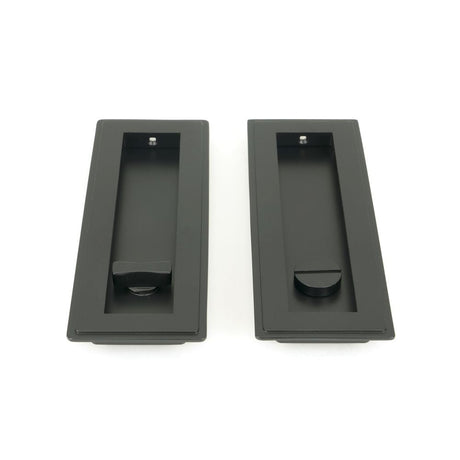 This is an image showing From The Anvil - Matt Black 175mm Art Deco Rectangular Pull - Privacy Set available from trade door handles, quick delivery and discounted prices