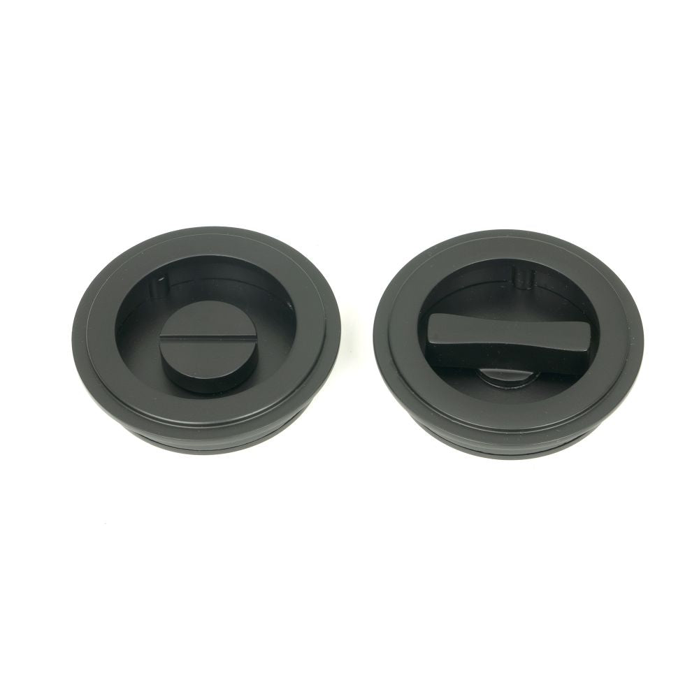 This is an image of From The Anvil - Matt Black 60mm Art Deco Round Pull - Privacy Set available to order from T.H Wiggans Architectural Ironmongery in Kendal, quick delivery and discounted prices.