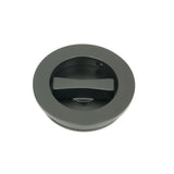 This is an image showing From The Anvil - Matt Black 60mm Plain Round Pull - Privacy Set available from trade door handles, quick delivery and discounted prices