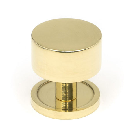 This is an image showing From The Anvil - Polished Brass Kelso Cabinet Knob - 32mm (Plain) available from T.H Wiggans Architectural Ironmongery in Kendal, quick delivery and discounted prices