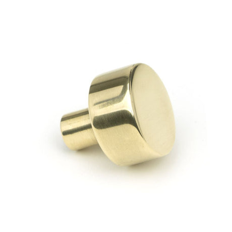 This is an image showing From The Anvil - Aged Brass Kelso Cabinet Knob - 25mm (No rose) available from trade door handles, quick delivery and discounted prices
