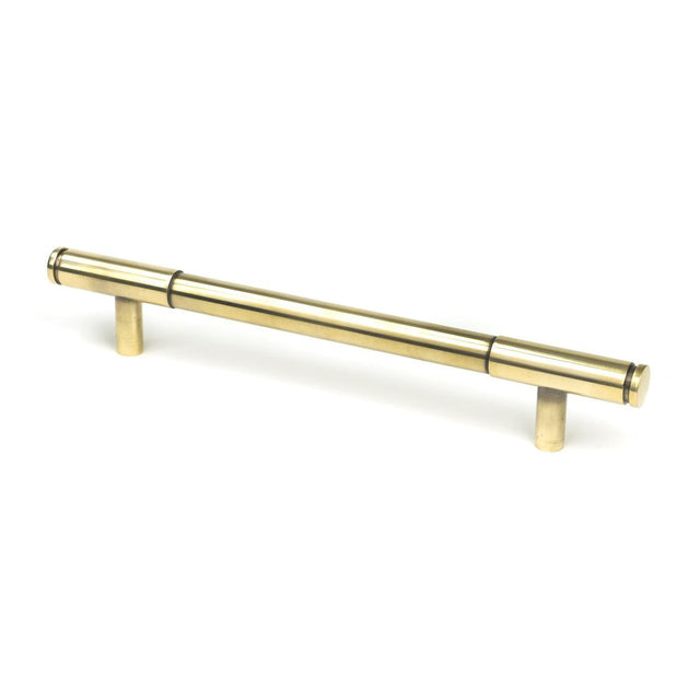 This is an image showing From The Anvil - Aged Brass Kelso Pull Handle - Medium available from T.H Wiggans Architectural Ironmongery in Kendal, quick delivery and discounted prices
