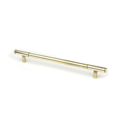This is an image showing From The Anvil - Aged Brass Kelso Pull Handle - Large available from T.H Wiggans Architectural Ironmongery in Kendal, quick delivery and discounted prices