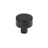 This is an image showing From The Anvil - Matt Black Kelso Cabinet Knob - 25mm (No rose) available from T.H Wiggans Architectural Ironmongery in Kendal, quick delivery and discounted prices