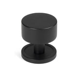 This is an image showing From The Anvil - Matt Black Kelso Cabinet Knob - 32mm (Plain) available from T.H Wiggans Architectural Ironmongery in Kendal, quick delivery and discounted prices