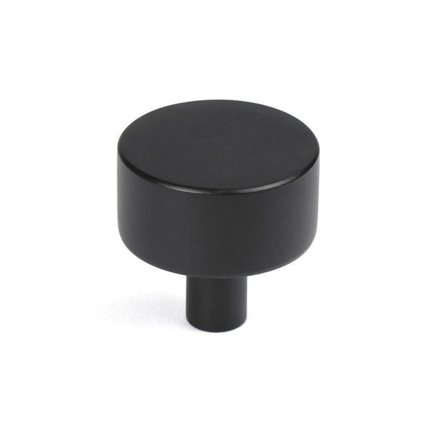 This is an image showing From The Anvil - Matt Black Kelso Cabinet Knob - 32mm (No rose) available from T.H Wiggans Architectural Ironmongery in Kendal, quick delivery and discounted prices