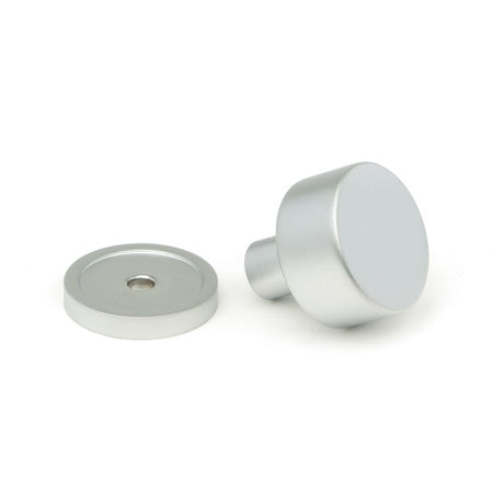 This is an image showing From The Anvil - Satin Chrome Kelso Cabinet Knob - 25mm (Plain) available from trade door handles, quick delivery and discounted prices