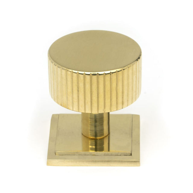 This is an image showing From The Anvil - Polished Brass Judd Cabinet Knob - 32mm (Square) available from T.H Wiggans Architectural Ironmongery in Kendal, quick delivery and discounted prices