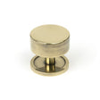 This is an image showing From The Anvil - Aged Brass Kelso Cabinet Knob - 38mm (Plain) available from T.H Wiggans Architectural Ironmongery in Kendal, quick delivery and discounted prices