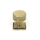 This is an image showing From The Anvil - Aged Brass Judd Cabinet Knob - 25mm (Square) available from T.H Wiggans Architectural Ironmongery in Kendal, quick delivery and discounted prices