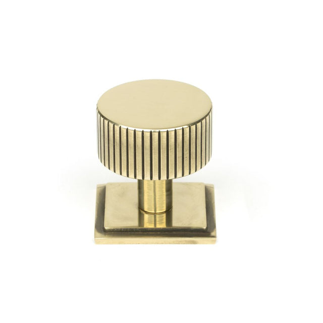 This is an image showing From The Anvil - Aged Brass Judd Cabinet Knob - 32mm (Square) available from T.H Wiggans Architectural Ironmongery in Kendal, quick delivery and discounted prices