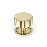 This is an image showing From The Anvil - Aged Brass Judd Cabinet Knob - 38mm (Plain) available from T.H Wiggans Architectural Ironmongery in Kendal, quick delivery and discounted prices