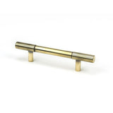 This is an image showing From The Anvil - Aged Brass Judd Pull Handle - Small available from T.H Wiggans Architectural Ironmongery in Kendal, quick delivery and discounted prices
