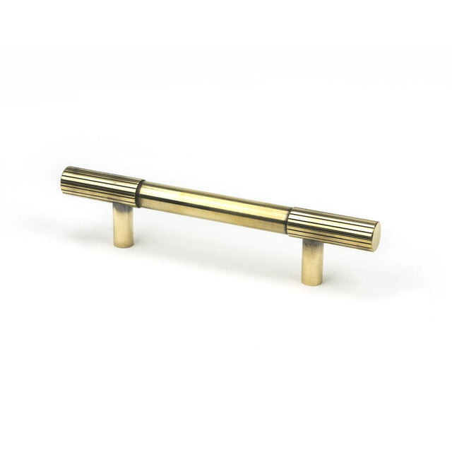 This is an image showing From The Anvil - Aged Brass Judd Pull Handle - Small available from T.H Wiggans Architectural Ironmongery in Kendal, quick delivery and discounted prices