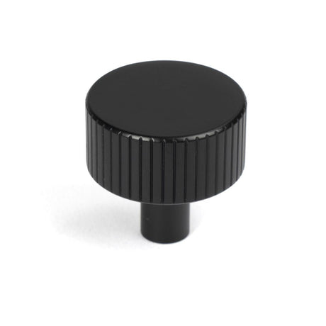 This is an image showing From The Anvil - Matt Black Judd Cabinet Knob - 32mm (No rose) available from T.H Wiggans Architectural Ironmongery in Kendal, quick delivery and discounted prices