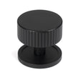 This is an image showing From The Anvil - Matt Black Judd Cabinet Knob - 38mm (Plain) available from T.H Wiggans Architectural Ironmongery in Kendal, quick delivery and discounted prices