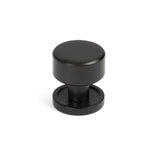 This is an image showing From The Anvil - Aged Bronze Kelso Cabinet Knob - 25mm (Plain) available from T.H Wiggans Architectural Ironmongery in Kendal, quick delivery and discounted prices