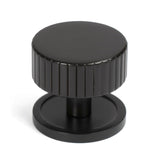 This is an image showing From The Anvil - Aged Bronze Judd Cabinet Knob - 38mm (Plain) available from T.H Wiggans Architectural Ironmongery in Kendal, quick delivery and discounted prices
