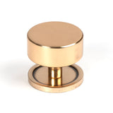 This is an image showing From The Anvil - Polished Bronze Kelso Cabinet Knob - 38mm (Plain) available from T.H Wiggans Architectural Ironmongery in Kendal, quick delivery and discounted prices