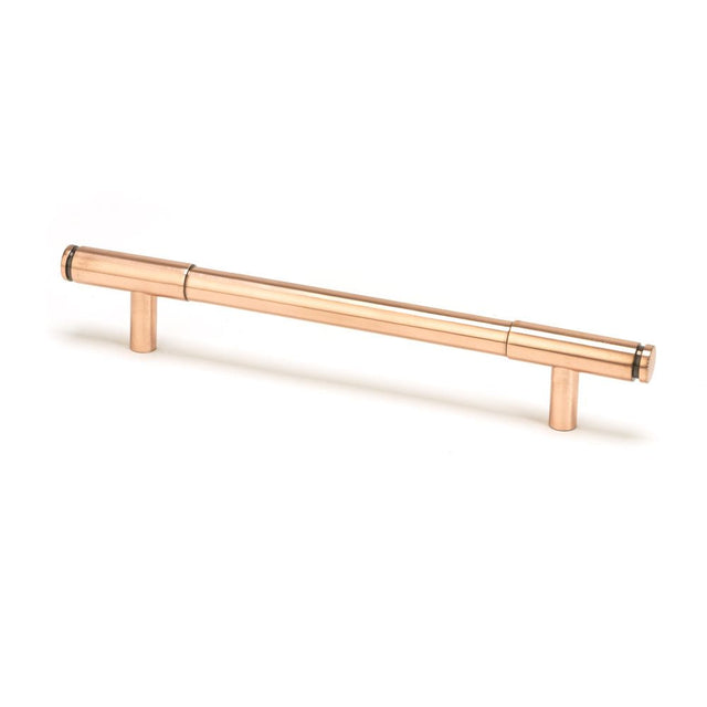 This is an image showing From The Anvil - Polished Bronze Kelso Pull Handle - Medium available from T.H Wiggans Architectural Ironmongery in Kendal, quick delivery and discounted prices
