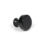 This is an image showing From The Anvil - Matt Black Scully Cabinet Knob - 25mm available from trade door handles, quick delivery and discounted prices